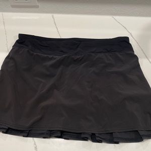 Lulu pleated black tennis skirt.  Size 10. EUC